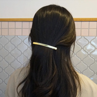 long metallic hairpin  
