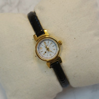 round frame leather watch